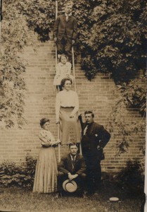 Eunice Stinson (standing left) acted as the Kingsley Librarian from 1914 to 1939. Pictured here with her husband, Postmaster Ambrose Burnside Stinson (standing right), children Harold, Rhea and Bernice Stinson, with friend Floyd McDonald on bottom.