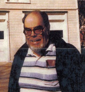 Robert Wilhelm, noted local historian, pictured in front of a Traverse City carriage house.