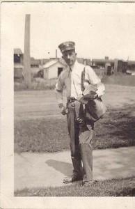 Jack Wallis serving as postman in Ann Arbor, ca. 1915.