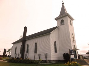 Exterior of St. Mary of Hannah in 2014, a Catholic church in Grand Traverse County, south of Chum's Corners and west of Kingsley on M1-13. Photo credit to GTJ editors.