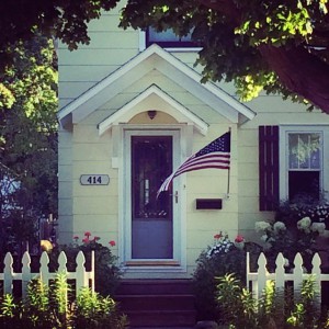 Although small, Cathy says the lovely garden out front is as inviting as any deep porch. Photo courtesy of the Lancasters, #tcfrontporches on Instagram.