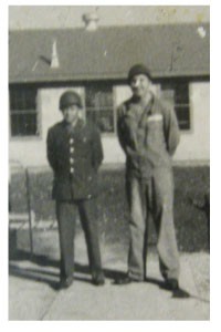 Jerry Lord is the big guy on the right.  The photo was damaged somehow in the last 69 years—he really had a nose.