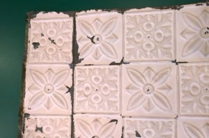 The ceiling of Beyer's Grocery, now on display at the Kingsley Branch Library. Image and artifact courtesy of Yacks.